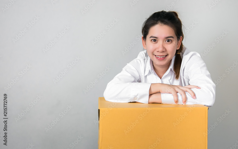 Transport business owner. Is smiling and hand on the box. Transport business owner. Is smiling and hand on the box.