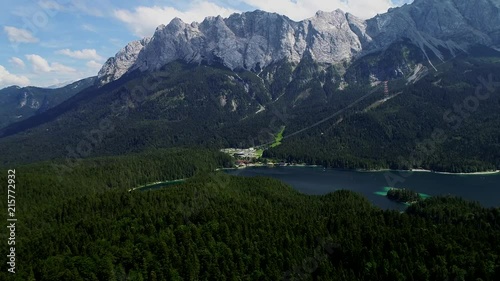 4K scenic flight of Eibsee in Bavaria on the bottom of Zugspitze the highest mountain in germany