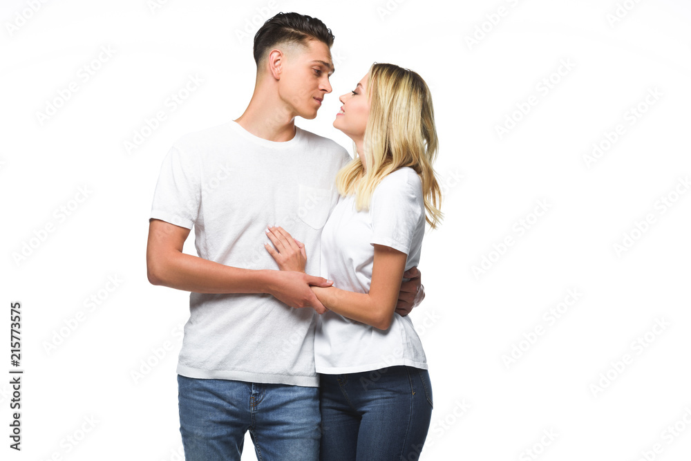 affectionate couple hugging and going to kiss isolated on white affectionate couple hugging and going to kiss isolated on white
