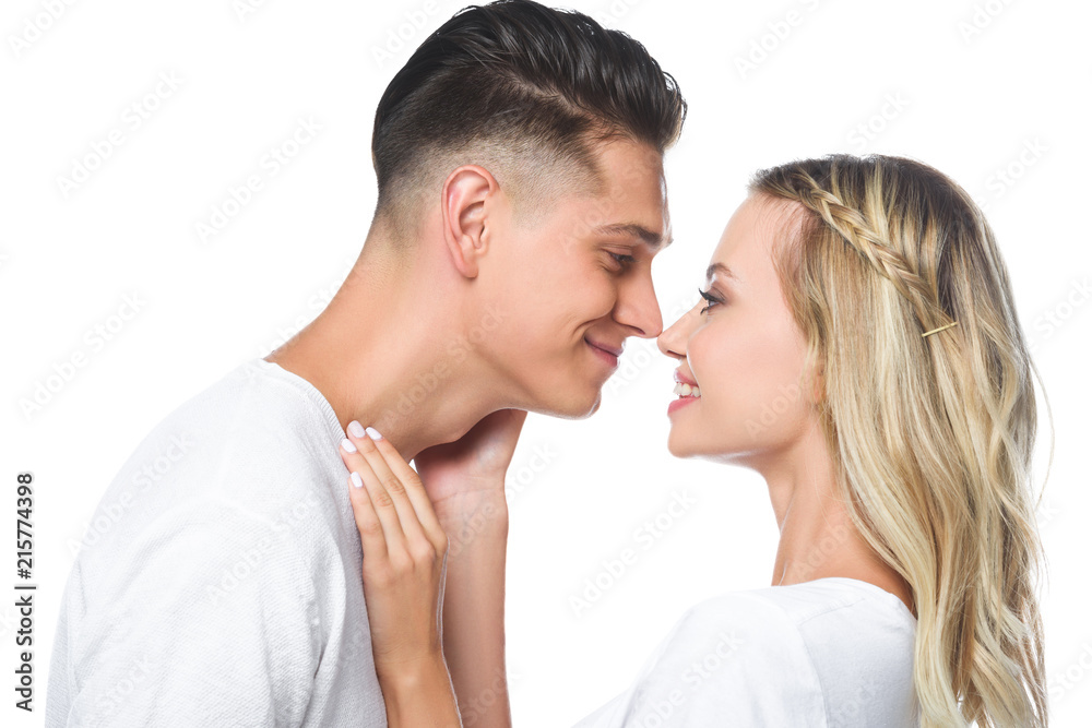 side view of happy couple going to kiss isolated on white side view of happy couple going to kiss isolated on white