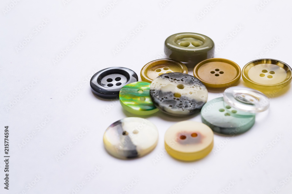 Clothes buttons isolated. Closeup photo shot Clothes buttons isolated. Closeup photo shot