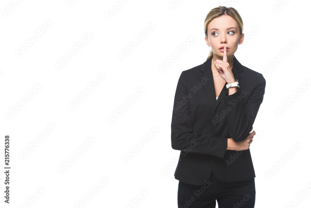 Stylish young businesswoman showing silence sign isolated on white Stylish young businesswoman showing silence sign isolated on white