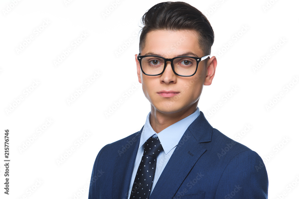 close-up portrait of handsome young businessman in blue jacket looking at camera isolated on white