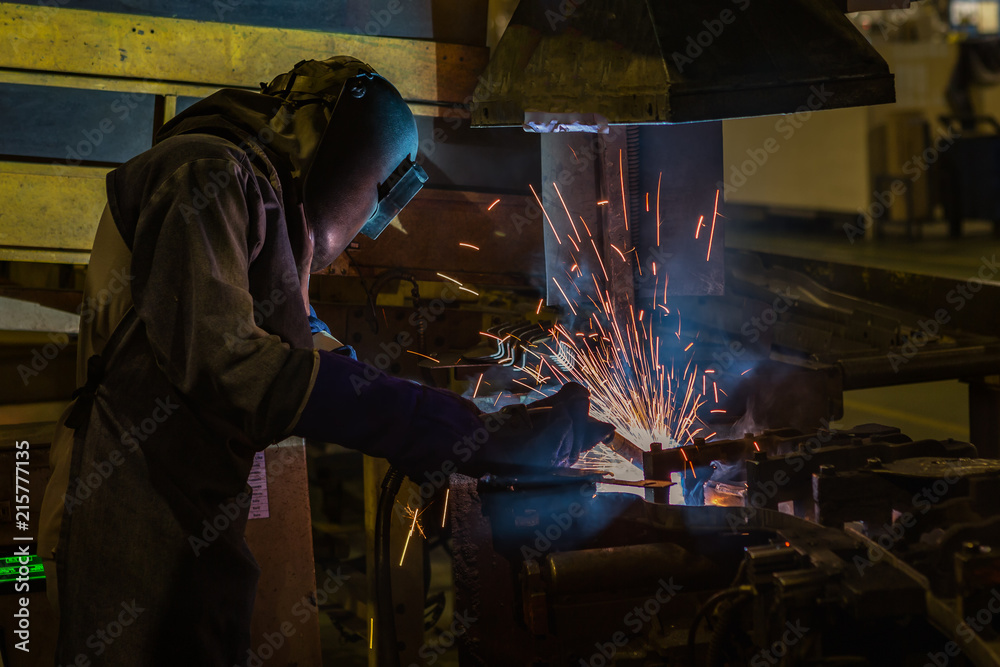 Industrial worker is welding repair his work in factory Industrial worker is welding repair his work in factory