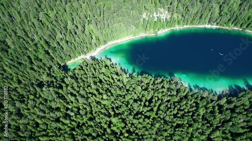 4K scenic flight of Eibsee in Bavaria on the bottom of Zugspitze the highest mountain in germany