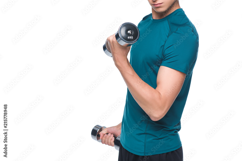 cropped shot of young sportsman exercising with dumbbells isolated on white cropped shot of young sportsman exercising with dumbbells isolated on white