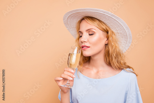 My favorite carbonated beverage! Close up photo portrait of beautiful pretty gentle tender sweet lovely lady tasting expensive drink holding in hand isolated on pastel bright color background