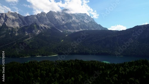 4K scenic flight of Eibsee in Bavaria on the bottom of Zugspitze the highest mountain in germany