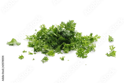 Fresh green chopped parsley leaves isolated on white background