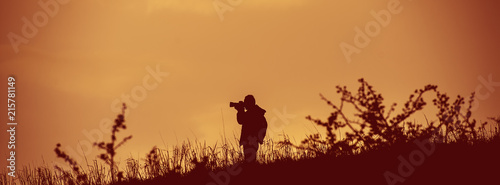 Bild auf Leinwand Photographer Takes Pictures in the Wild