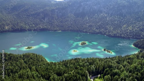 4K scenic flight of Eibsee in Bavaria on the bottom of Zugspitze the highest mountain in germany