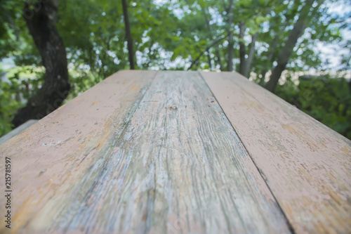 Empty wood table top on blur abstract background