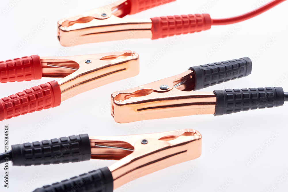close up view of jump start cables isolated on white