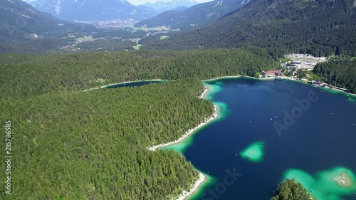 4K scenic flight of Eibsee in Bavaria on the bottom of Zugspitze the highest mountain in germany