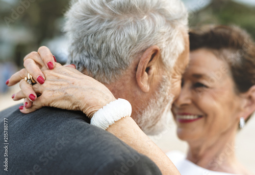 Mature couple getting married at the beach