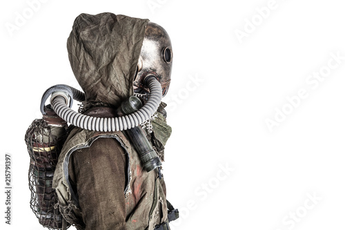 Scary post apocalyptic, living underground, creature with vintage lantern on shoulder, wearing rags and creepy full-face gas mask under tattered hood, studio shoot isolated on white with copy space