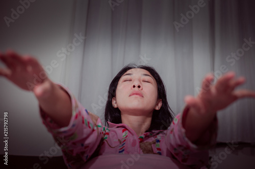 Asian woman sleepwalk in her sleep have a nightmare . photo