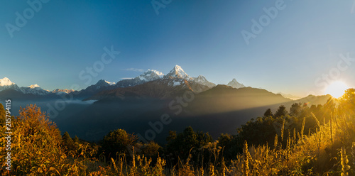 Panorama of the Annapurna mountain range in the Himalayas, from Poon Hill trek viewpoint in Nepal. photo