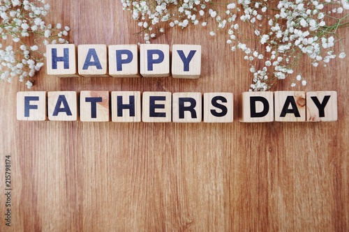 happy fathers day alphabet letters on wooden background