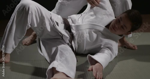 Judo throw technique close up handheld camera