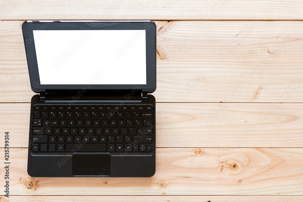 top view of laptop computer on wooden background top view of laptop computer on wooden background