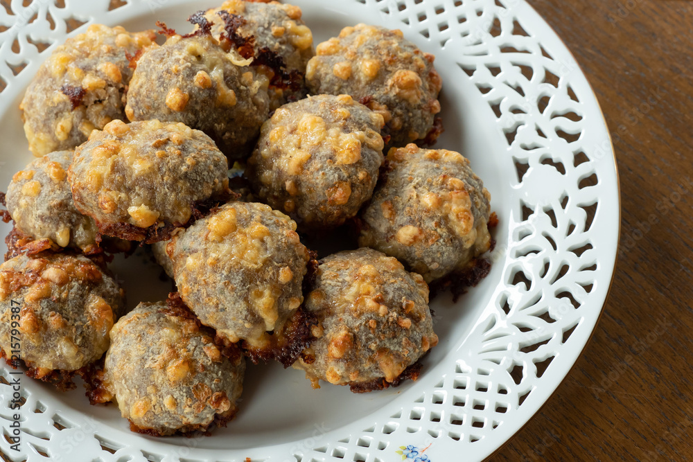 Homemade food, meat balls with cheese.