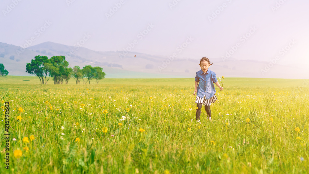 A girl playing on the prairie