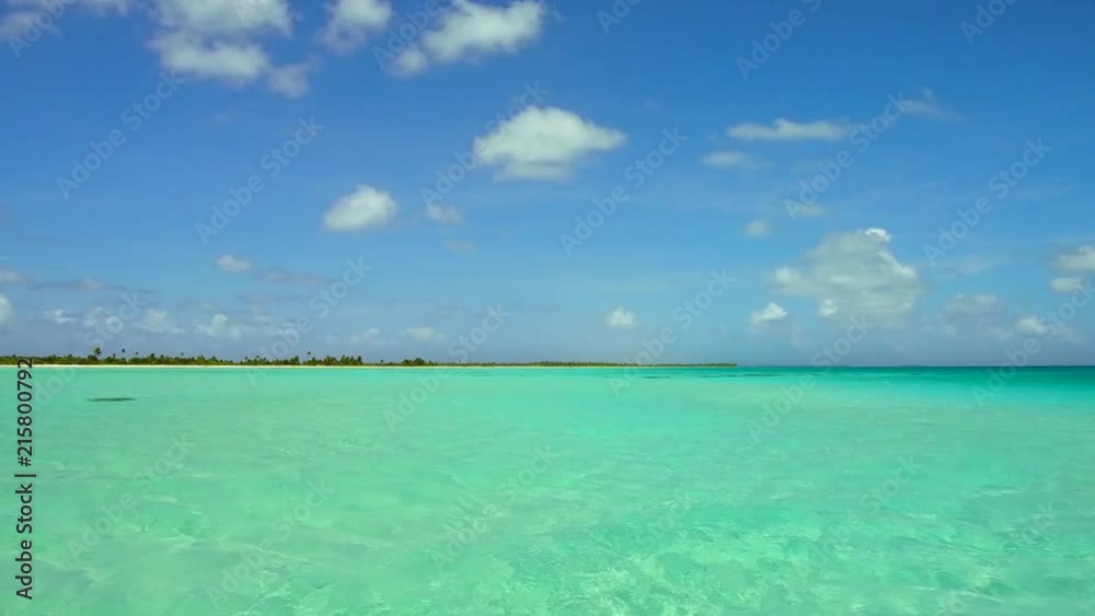 travel, seascape and nature concept - lagoon at tropical beach in french polynesia travel, seascape and nature concept - lagoon at tropical beach in french polynesia