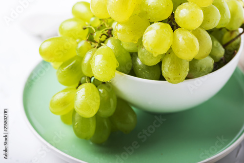Sweet white grape on the table
