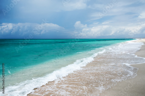 Beautiful seascape, turquoise sea and blue clouds before a thunderstorm. photo