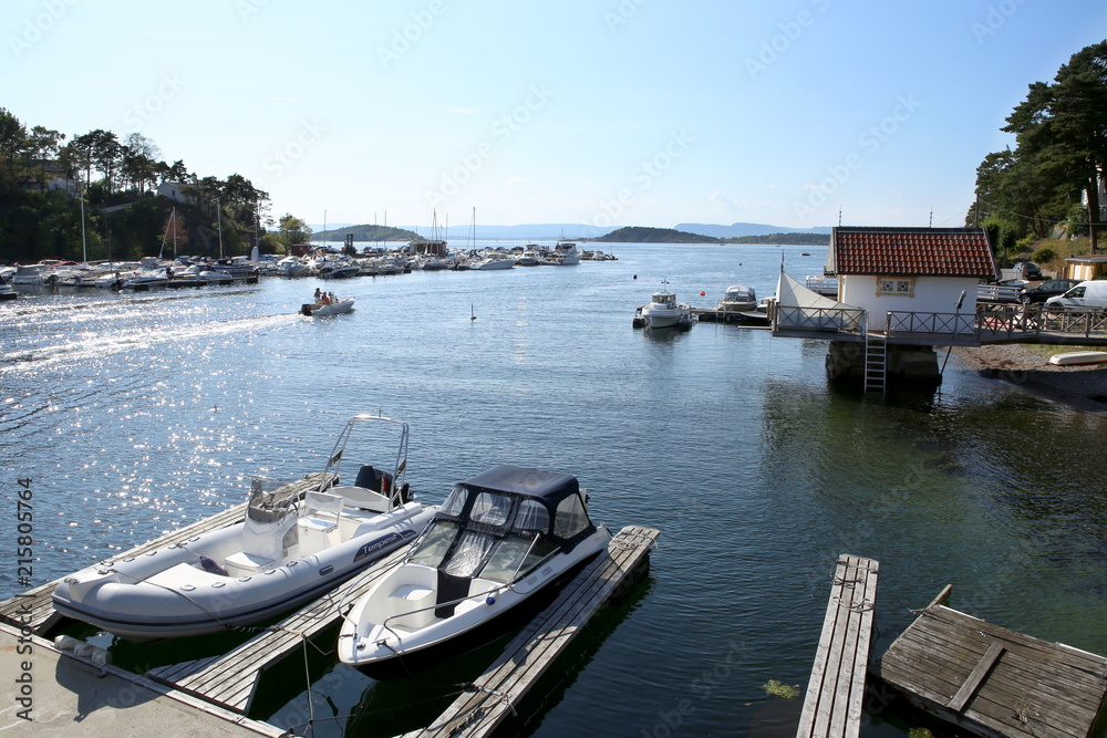 Oslo, Norway - July 22, 2018: Motor boats in the harbor in Oslo Fjord. Oslo harbor is located  in the inner Oslofjord, just east of the city center. 