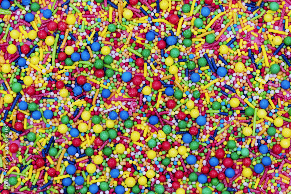 Colourful candy cake decorative sprinkles background