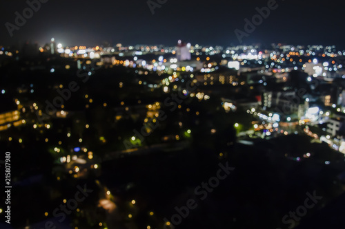Abstract aerial panorama view of colorful blurry bokeh light from the city on beautiful summer night.