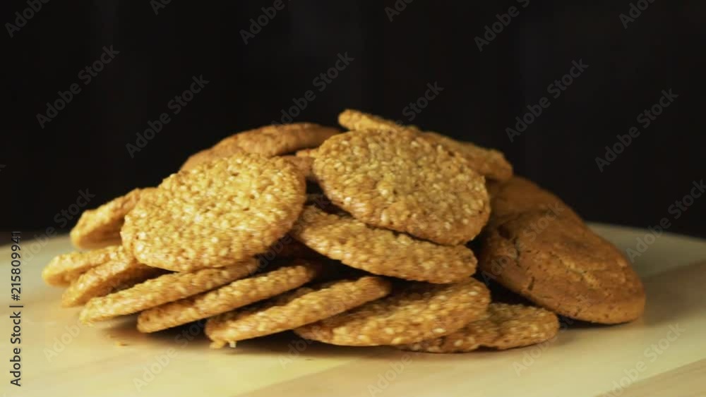 cookies falling on the table. slow motion. cookies falling on the table. slow motion.