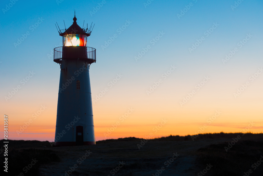 Silhouette of Lighthouse List-West after sunset.