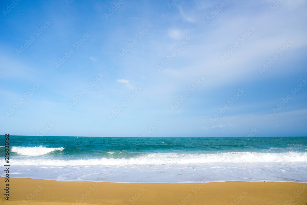 White Sea wave and blue ocean with sandy beach Background in Summer holidays Time of Happiness