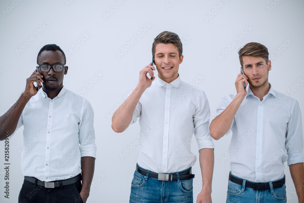 group of business people talking on a mobile phone. group of business people talking on a mobile phone.