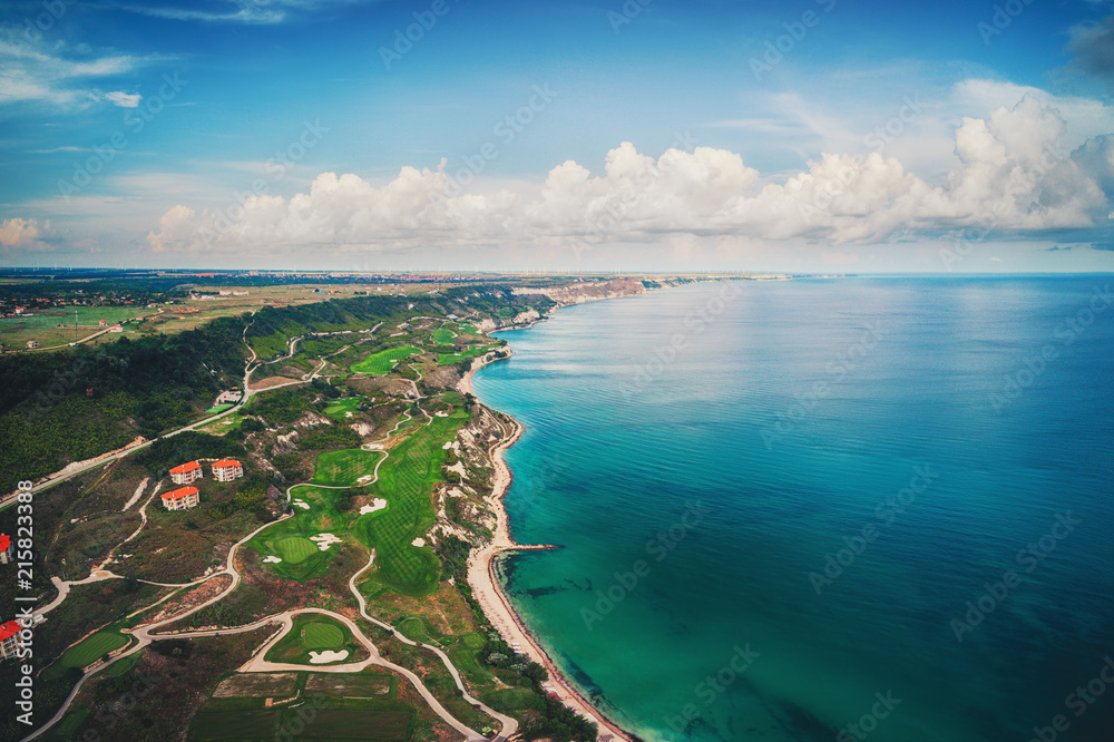 Aerial drone view of a golf course next to the cliffs and Black sea