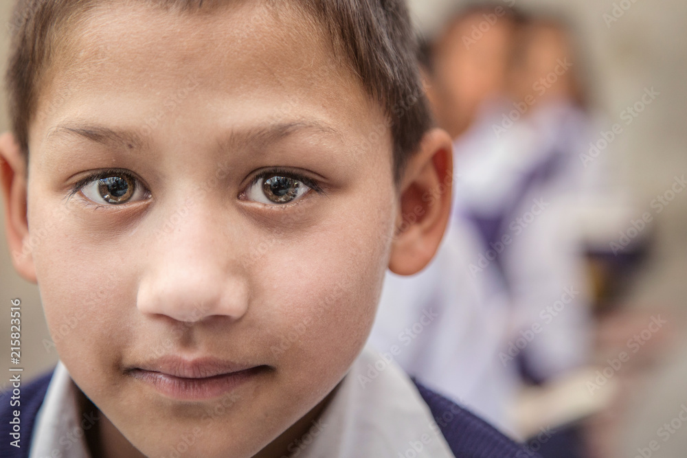 Portrait of smiling elementary Indian/Asian school Boy looking at camera. Portrait of smiling elementary Indian/Asian school Boy looking at camera.