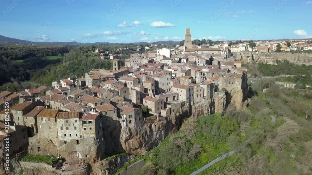 Aerial view of Pitigliano - Old Italian city, stone made, above a cliff BottomUpFrontal Aerial view of Pitigliano - Old Italian city, stone made, above a cliff BottomUpFrontal
