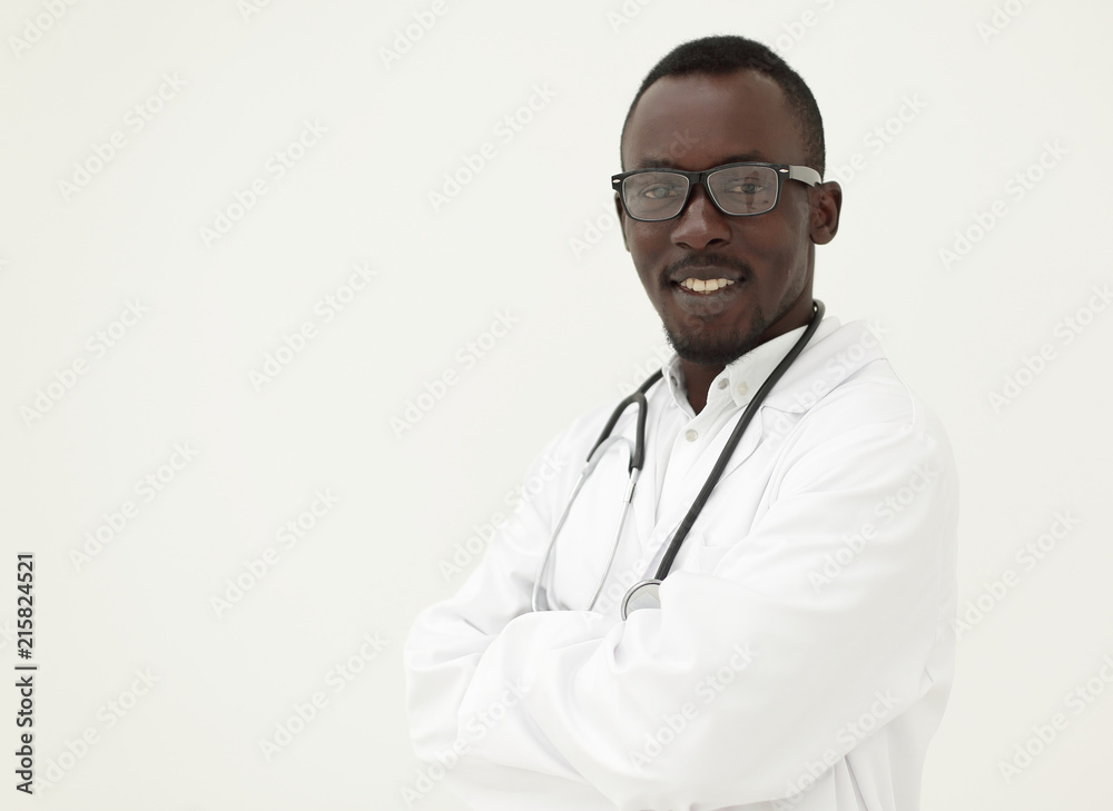 portrait of a responsible young doctor on a light background. portrait of a responsible young doctor on a light background.