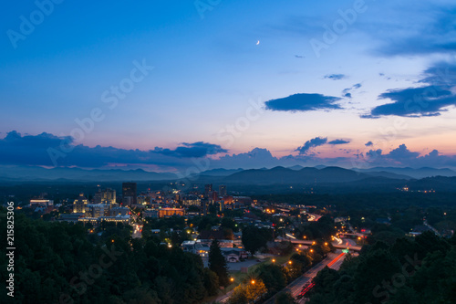 Twilight scene overlooking Asheville, a destination vacation mountain town in western North Carolina