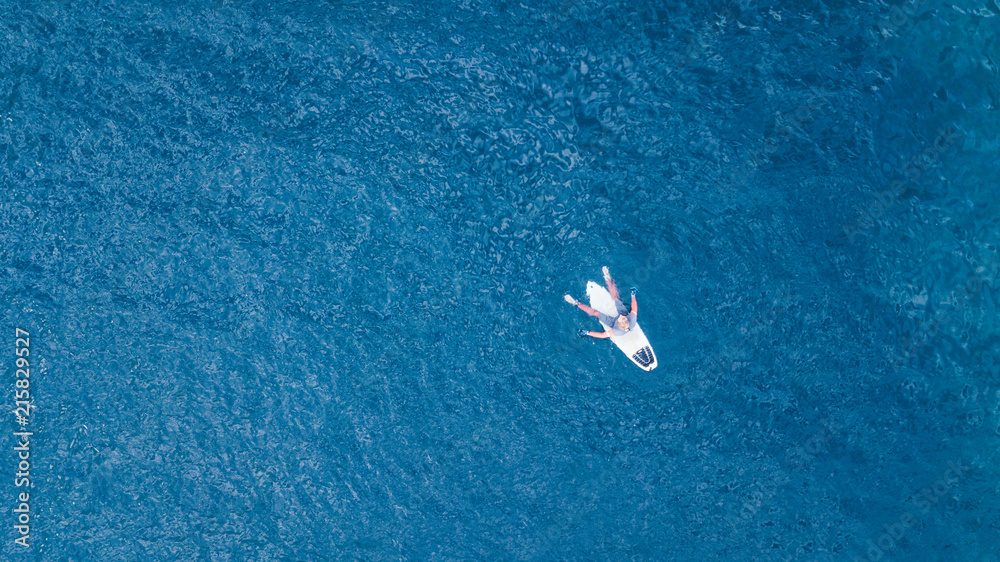 Top view of a man paddling.