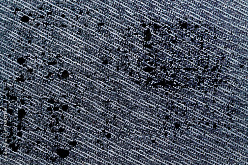 Grunge dirty Blue denim macro texture with seam for jeans background