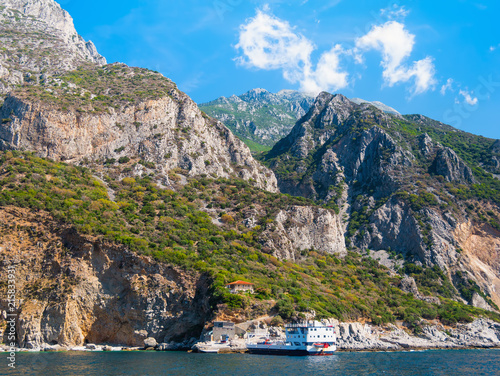 Photos Ship standing on the pier. Aegean Sea. Athos, Greece