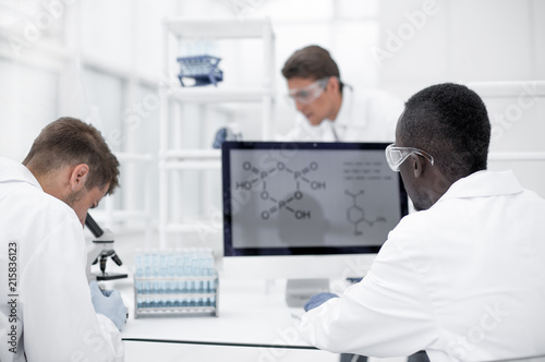 group of scientists in a modern laboratory