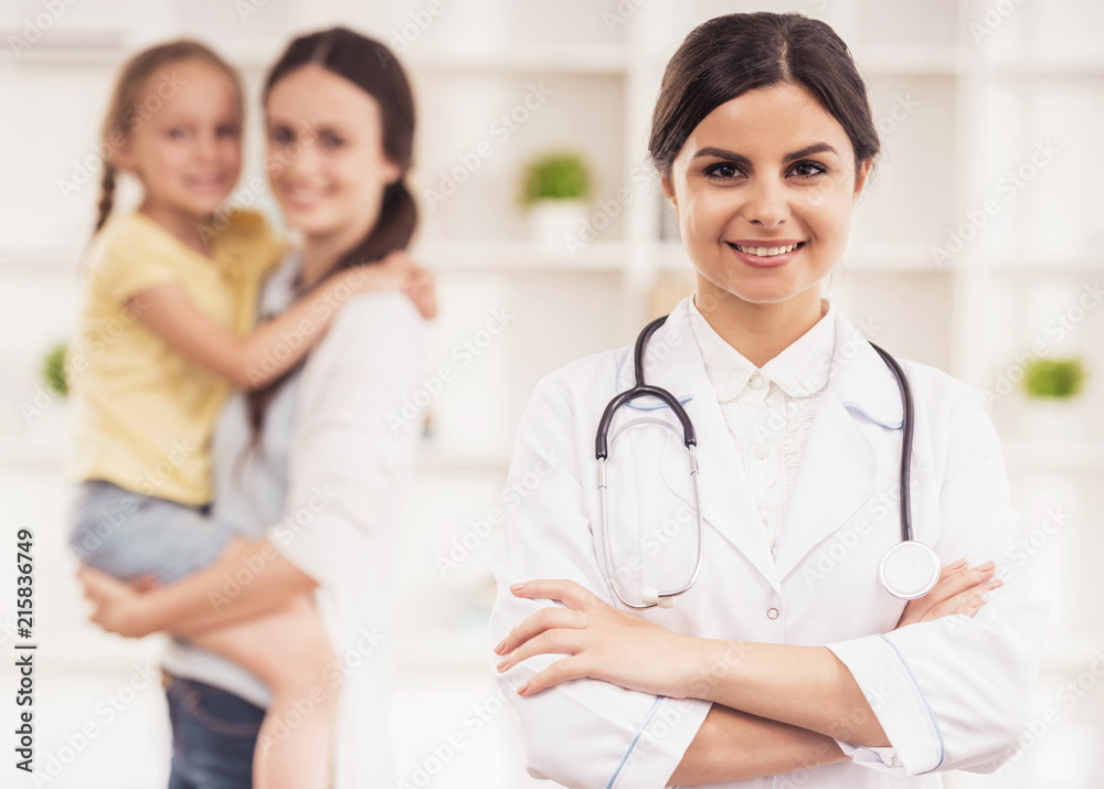 Successful Young Doctor with Patients in Hospital. Successful Young Doctor with Patients in Hospital.