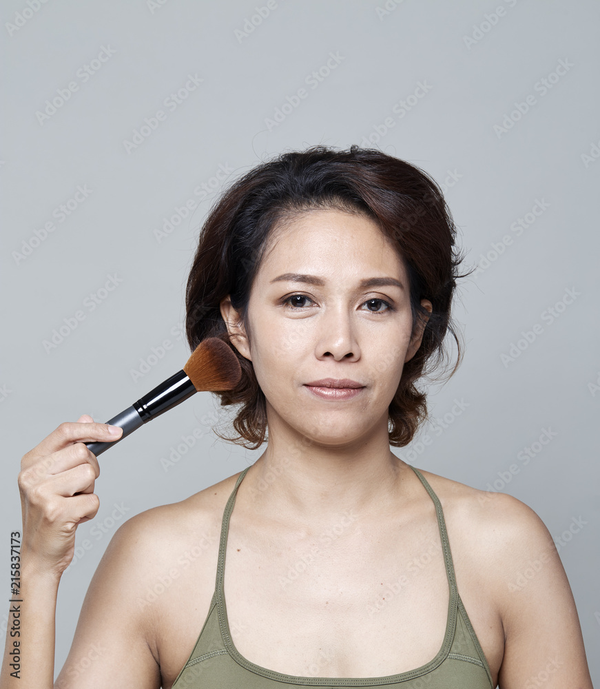 a beauty girl on the grey background a beauty girl on the grey background