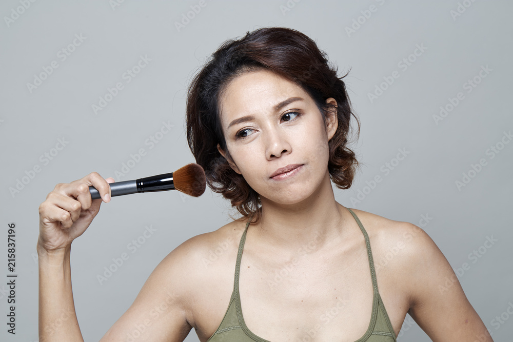 a beauty girl on the grey background