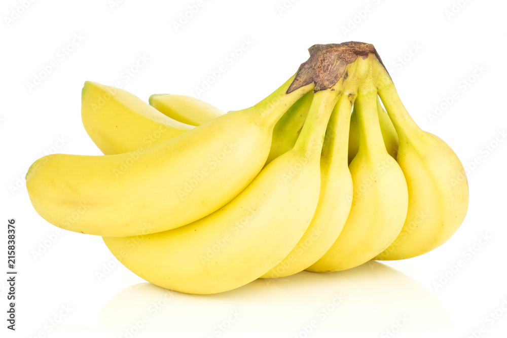 Group of eight whole fresh yellow banana one cluster isolated on white background Group of eight whole fresh yellow banana one cluster isolated on white background